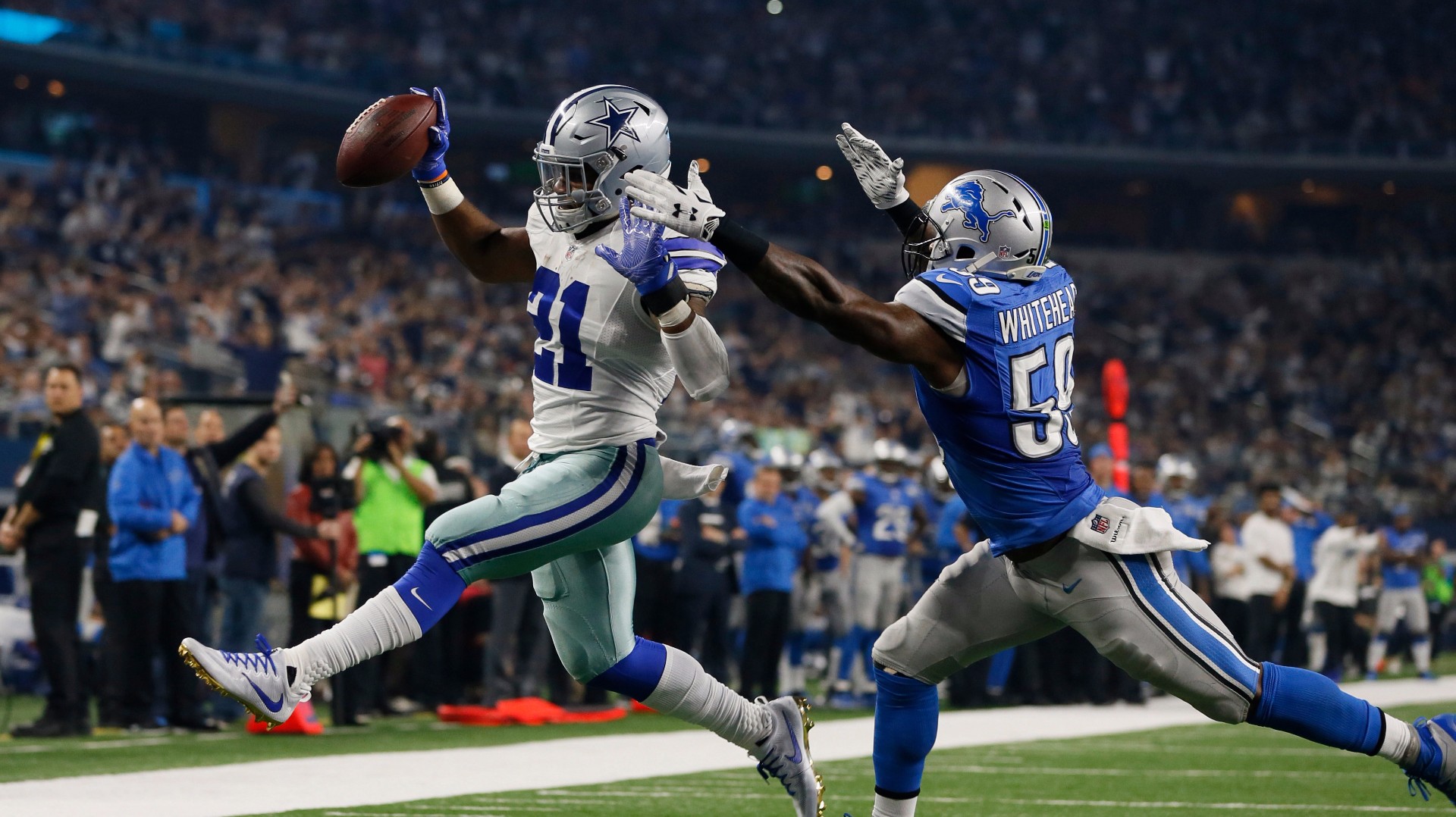 Cowboys blow out Lions 42-21, improve to 13-2