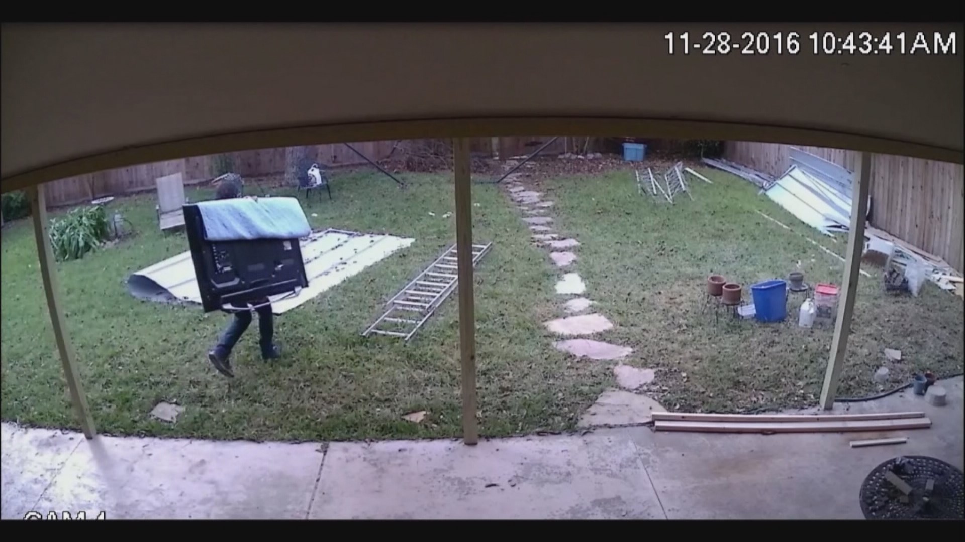 'Caught on camera' Surveillance shows man stealing TV